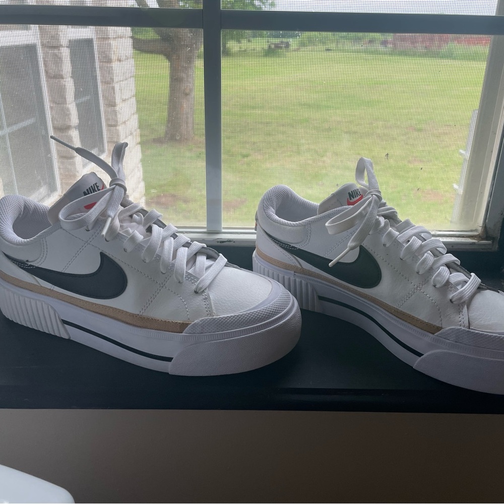 Nike White Platform Sneakers with Black Swoosh and Tan Stripe